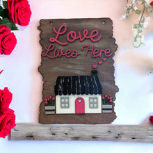 Load image into Gallery viewer, Love Lives Here hanging sign
